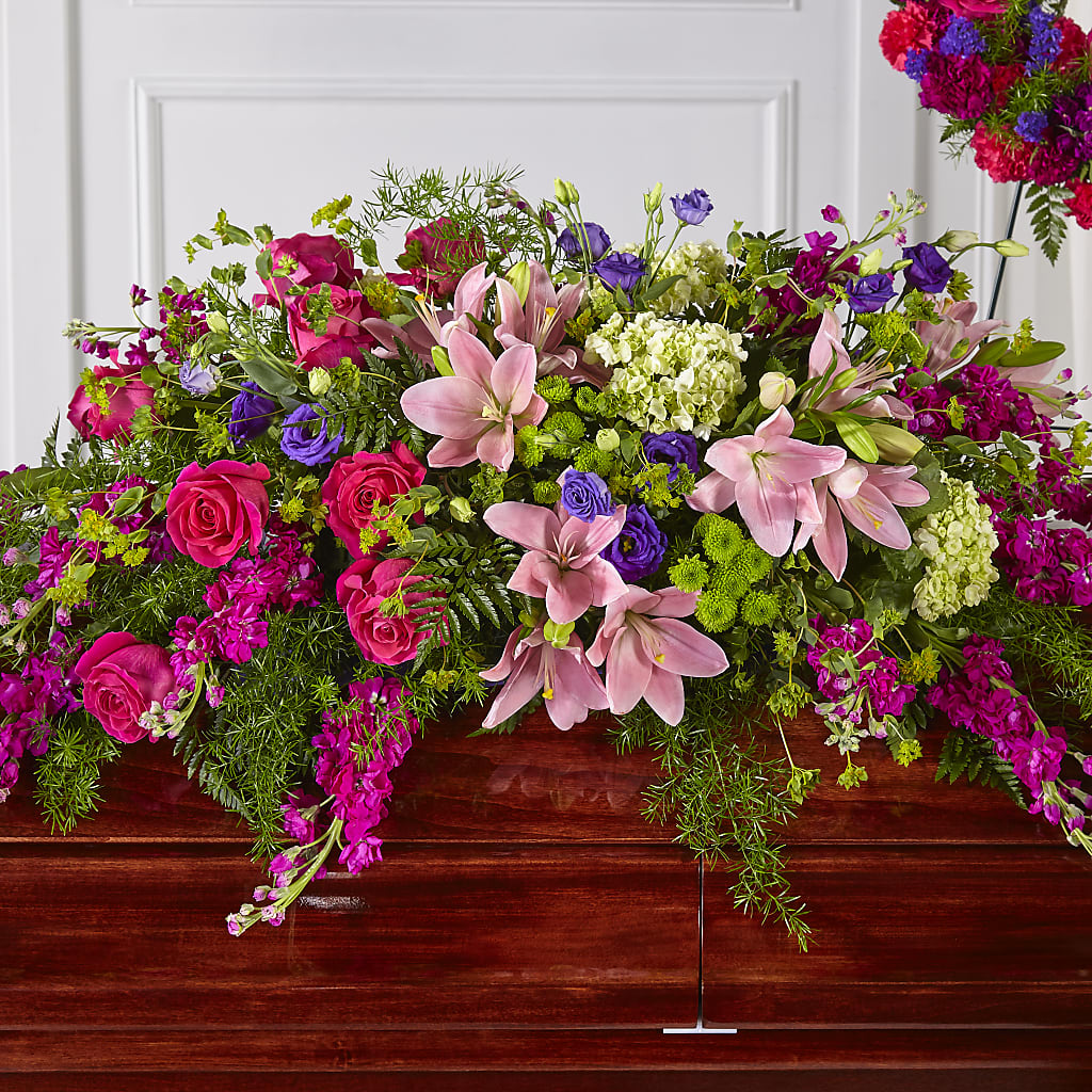 Radiant Tribute Casket Spray – NEIL'S FLOWERS AND GREENHOUSES, Kingston ON